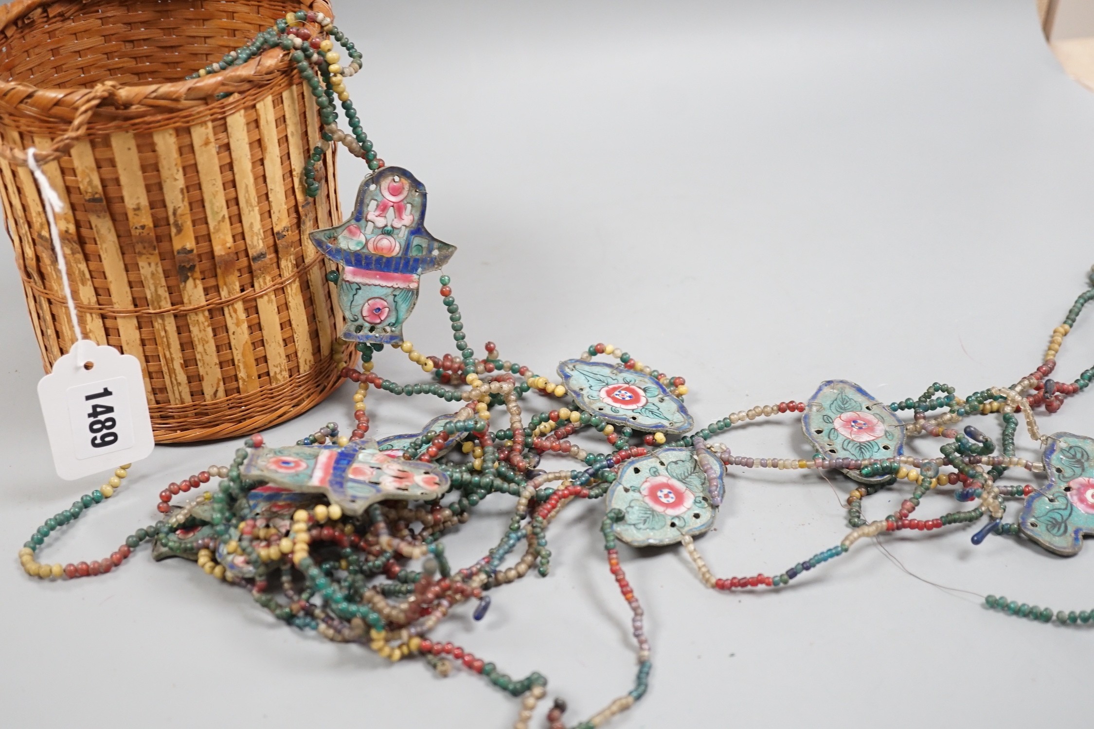 A group of Chinese enamel and glass bead hanging decorations, early 20th century